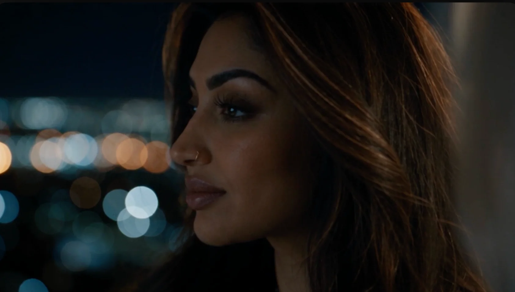 Cinematic close-up of Sonia’s avatar against softly blurred city lights at night