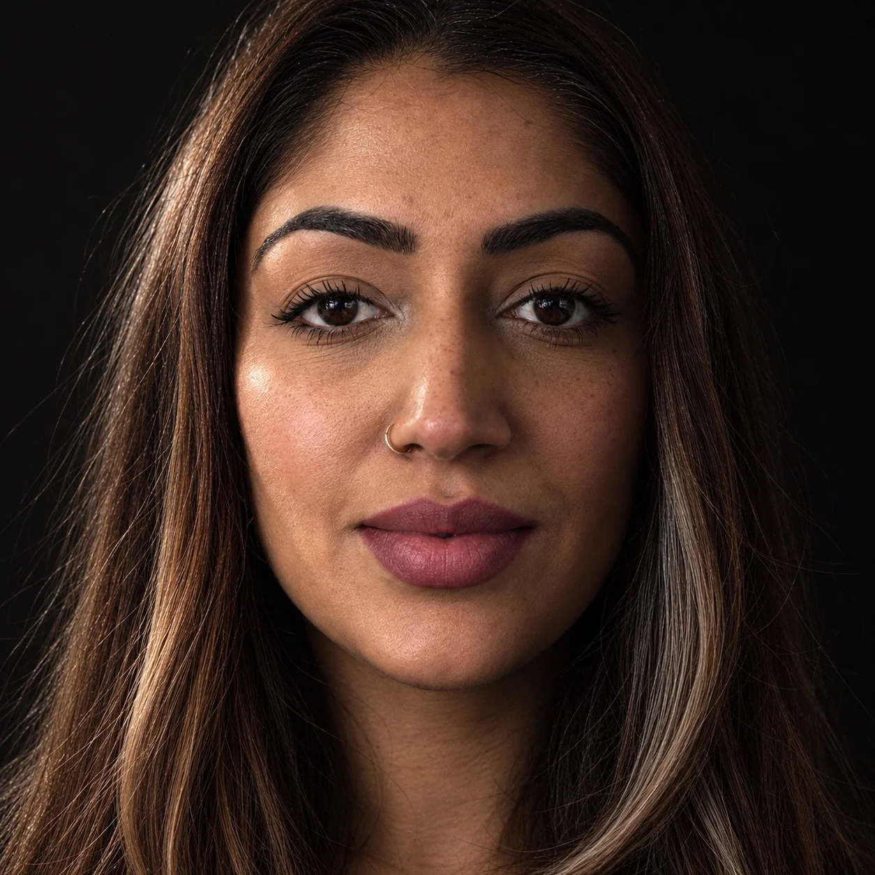 Sonia portrait with natural skin texture and warm side lighting